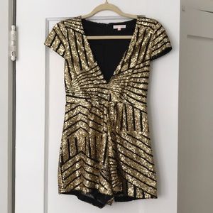 Black and gold sequined romper.